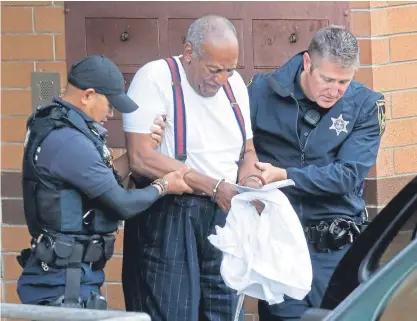  ?? Picture: AP. ?? A handcuffed Bill Cosby is escorted from the court after being sentenced.