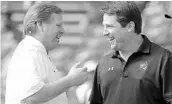  ?? JOHN RAOUX/ASSOCIATED PRESS ?? Will UF’s Jim McElwain, left, and South Carolina’s Will Muschamp face difficult nonconfere­nce schedules.