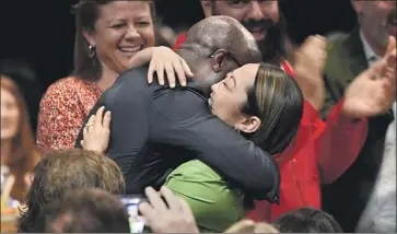  ?? Chris Pizzello Associated Press ?? LULU WANG hugs her boyfriend, fellow filmmaker Barry Jenkins, after Zhao Shuzhen wins the award for best supporting actress in Wang’s “The Farewell.” All five nominees in the category were women of color.