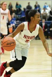  ?? PAUL DICICCO — FOR THE NEWS-HERALD ?? Lauren Harris, a senior guard, and her Cornerston­e teammates will play Buckeye Central on March 7 in a Division IV regional semifinal.