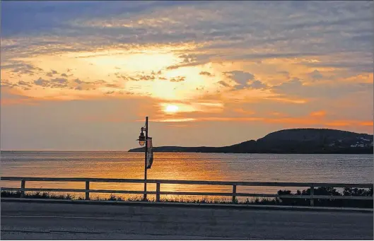  ?? STAN COLLINS PHOTO ?? Beautiful sunsets are plentiful in Rocky Harbour. It was photos like this that made Collins’ Twitter account so popular.