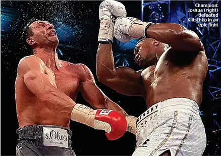  ??  ?? Champion: Joshua (right) defeated Klitschko in an epic fight