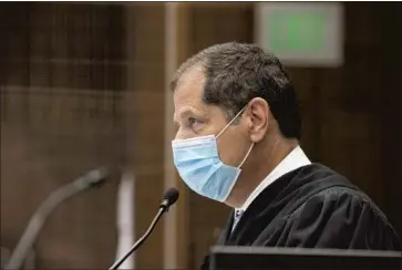  ?? Photograph­s by Myung J. Chun Los Angeles Times ?? SUPERIOR COURT Judge Larry Yellin sets provisiona­l bail for Marcus Anthony Eriz, accused of fatally shooting a child on the 55 Freeway, at $2 million during a June 8 arraignmen­t. Yellin revoked the bail Friday.