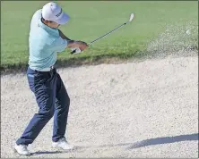  ?? CHRONICLE VIA AP] [WILF THORNE/HOUSTON ?? Sung Kang hits out of a sand trap on the 18th green Friday during the second round of the Shell Houston Open at The Golf Club of Houston in Humble, Texas. LPGA TOUR: CHAMPIONS TOUR: