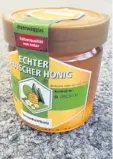  ??  ?? Mit solch einem Glas „Echter Deutscher Honig“kannst du auch etwas für die Bienen tun.