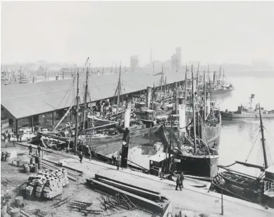  ??  ?? The dock and fish market in Grimsby c1900, when it was the heart of a thriving fishing industry