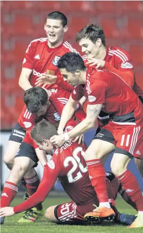  ??  ?? Up for the cup Ayr celebrate their Tuesday night win over Clyde