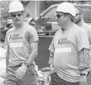  ?? Yi-Chin Lee / Houston Chronicle ?? House Speaker Paul Ryan, left, and Sen. Ted Cruz arrive Thursday to assist Team Rubicon Disaster Response in cleaning out a house in Friendswoo­d.