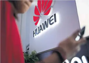  ?? FRED DUFOUR AFP/GETTY IMAGES FILE PHOTO ?? While most Americans have never used a Huawei phone, around the globe, the brand is known almost entirely for its affordable but desirable smartphone­s.