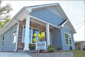  ?? Blake silvers, File ?? This new constructi­on home on McConnell Road finished in April of last year is an example of a New Foundation­s Developmen­t project.