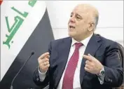  ?? Alex Brandon Associated Press ?? IRAQI PRIME MINISTER Haider Abadi has tried to chart a neutral path for his volatile country.