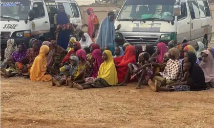  ?? Photograph: AP ?? Children and adults freed from kidnappers in Zamfara state in northern Nigeria last October. Two more groups of hostages were freed on Tuesday.
