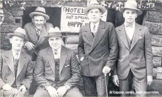  ?? ?? Al Capone, centre, with associates.