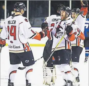  ?? SUBMITTED PHOTO ?? Brad Power of St. John’s, right, celebrates a goal with teammate Brendan Miller during a North American Hockey League game with the Corpus Christi Icerays this season. Power expects to play college hockey next season, either in the United States or...