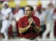  ?? JOHN BAZEMORE — THE ASSOCIATED PRESS FILE ?? Alabama head coach Nick Saban watches his team warm up for the Southeaste­rn Conference championsh­ip against Florida in Atlanta last season. The Tide has the No. 1 spot in the Associated Press’s preseason media poll for the second consecutiv­e year.