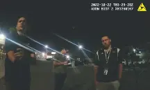  ?? MARICOPA County Sheriff’s Office ?? Maricopa County Sheriff ’s deputies, seen in an October image from video, discussed election law, including what constitute­s voter intimidati­on, with people observing drop boxes in Mesa, Ariz.