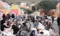  ?? PICTURE YAZEED KAMALDIEN ?? Bo-Kaap residents gathered in Wale Street last night for a boeka protest, against what they claim are greedy property developers and an unsympathe­tic City of Cape Town.