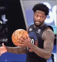  ?? Kathy Willens / Associated Press ?? Knicks forward Julius Randle finished with 21 points and 17 rebounds in Monday’s win over the Magic.