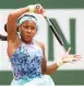  ?? CLIVE BRUNSKILL/GETTY ?? Coco Gauff hits a forehand during her victory over Elise Mertens on Sunday.