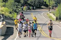  ?? COURTESY PHOTO ?? Runners participat­e in the 2016 Pueblo Independen­ce Day ceremonial run. This year’s run will start from the Walatowa plaza in Jemez Pueblo and end at the Giusewa Pueblo kiva at the Jemez Historic Site.