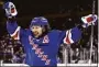  ?? Adam Hunger / Associated Press ?? The Rangers’ Artemi Panarin celebrates after a goal by Adam Fox against the Penguins during Game 1 on Tuesday.