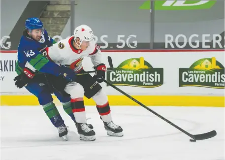  ?? BOB FRID/USA TODAY SPORTS FILES ?? Vancouver Canucks defenceman Quinn Hughes chases Senators forward Shane Pinto during a game last April at Rogers Arena in Vancouver. Pinto will be a focus of Senators brass after finishing last season with seven points in 12 games.