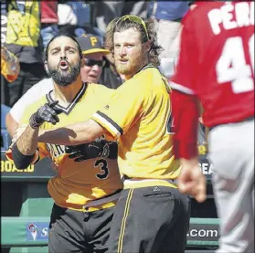  ?? JUSTIN K. ALLER / GETTY IMAGES ?? While with the Pirates, Sean Rodriguez (left) had to be restrained from taking part in a bench-clearing altercatio­n with the Nationals in September.