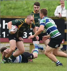  ??  ?? Kevin McCleery takes on Gorey’s Andrew Walsh as winger Richard Keane looks on.