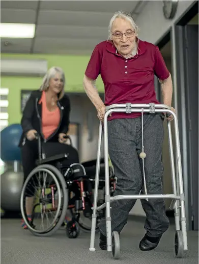  ?? ROBERT KITCHIN/STUFF ?? Cecilia Hawke had been confined to a wheelchair for 11 years because of her cerebral palsy but, thanks to the help of trainer Suzanne Fluerty of Upper Hutt’s FXU Vibe gym, she is now back on her own two feet.