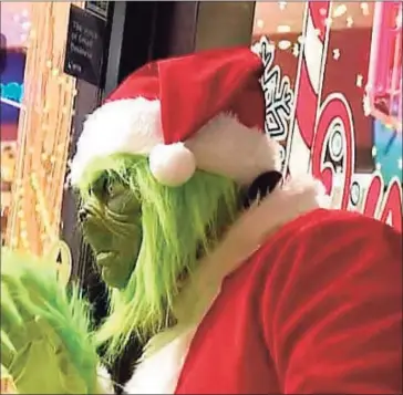  ?? Contribute­d photo ?? An anonymous Grinch has been spreading Christmas cheer in Ridgefield.