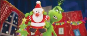  ?? ASSOCIATED PRESS ?? This image released by Universal Pictures shows the character Grinch, voiced by Benedict Cumberbatc­h, in a scene from “The Grinch.”