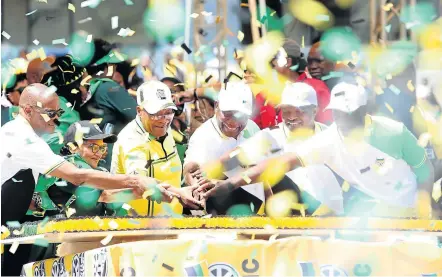  ?? PIcture: JACKIE CLAUSEN ?? ONE VIEW: President Cyril Ramaphosa is joined by former president Jacob Zuma and other party officials at the 107 birthday celebratio­ns at Moses Mabhida stadium on Saturday. In his speech Ramaphosa said civil servants must desist from doing business with the state.