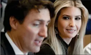  ??  ?? Lingering look: Ivanka Trump allows her gaze to wander in his direction
