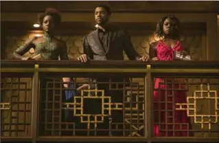  ?? MATT KENNEDY, THE ASSOCIATED PRESS ?? Lupita Nyong’o, left, Chadwick Boseman and Danai Gurira in "Black Panther," which hits theatres Feb. 16.