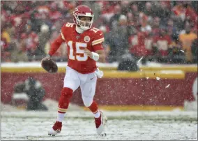  ?? ED ZURGA - THE ASSOCIATED PRESS ?? Kansas City Chiefs quarterbac­k Patrick Mahomes (15) carries the ball during the first half of an NFL football game against the Denver Broncos in Kansas City, Mo., Sunday, Dec. 15, 2019.