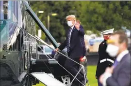  ?? PRESIDENT TRUMP Evan Vucci Associated Press ?? boards Marine One to return to the White House after being treated for COVID- 19 at the Walter Reed military hospital in Bethesda, Md.