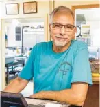  ?? ?? LEFT: John Michaelos, manager of the Old Spanish Sugar Mill restaurant in De Leon Springs State Park, reflects on 61 years of familyrun business at the restaurant.