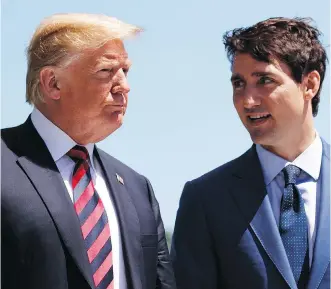  ?? EVAN VUCCI/THE ASSOCIATED PRESS ?? You have to wonder what President Donald Trump — shown with Prime Minister Justin Trudeau during the G-7 Summit — has in store for Canada, says Don Braid.