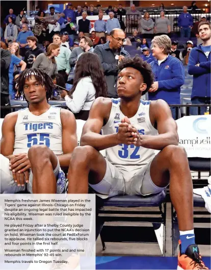  ?? JOE RONDONE/THE COMMERCIAL APPEAL ?? Memphis Tigers center James Wiseman waits to be introduced before they take on the UIC Flames at the Fedexforum on Friday. Earlier in this week, Wiseman was declared ineligible by the NCAA according to his attorney.