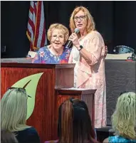  ?? ?? Jacquie Sullivan, founder of In God We Trust Inc, and Debbie Ormonde, president of Be Finally Free, share positive messages with local moms during a belated Mother’s Day celebratio­n at The Mission at Kern County on Saturday.