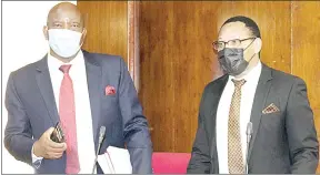  ??  ?? Deputy President Ndumiso Mduli in conversati­on with Sports, Culture and Youth Affairs Minister Harries ‘ Madze’ Bulunga.
