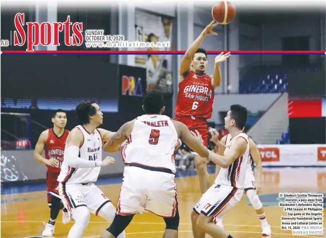  ?? PBA MEDIA BUREAU PHOTO ?? Ginebra’s Scottie Thompson executes a pass away from Blackwater’s defenders during a PBA Season 45 Philippine Cup game at the Angeles University Foundation Sports Arena and Cultural Center on Oct. 15, 2020.