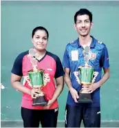  ??  ?? Overall winners Udaya Ranasinghe (R) and Ishara Madurangi