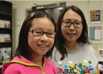  ?? OLIVER SACHGAU/TORONTO STAR ?? Amy, right, and Naomi Yuen say the fund has shown how much the community cares about Naomi’s treatment.