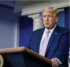  ?? Ap ?? ‘SCIENTIST-IN-CHIEF’: President Trump speaks at a news conference on Tuesday.