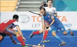 ?? AFP ?? India's SV Sunil in action against Hong Kong in the men's Pool A hockey match.