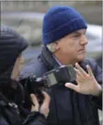  ?? BEBETO MATTHEWS ?? Gregory Abbott, founder and chairman of Internatio­nal Dispensing Corporatio­n, leaves after appearing in federal court in New York on bribery charges, Tuesday, March 12, 2019. Abbott is among dozens of people who were charged Tuesday in a scheme in which wealthy parents allegedly bribed college coaches and other insiders to get their children into some of the nation’s most elite schools.