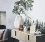  ?? ?? GLARING EXAMPLES: From top, neon Christmas lights and decoration­s from the Snow Mountain range from John Lewis.