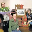  ??  ?? Great night Bingo prize-winner Donna McNaughton, organiser Marnie Gauld and bingo caller Iain Brock, alongside a Bailie chair draped in the Crieff Ancient Tartan of 1791