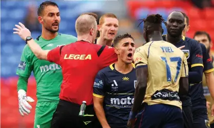  ?? ?? Tempers fray in the F3 derby at McDonald Jones Stadium on the opening weekend of the A-League Men season. Photograph: Ashley Feder/ Getty Images